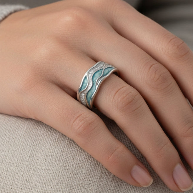 Elegant silverring med turkosa vågor
