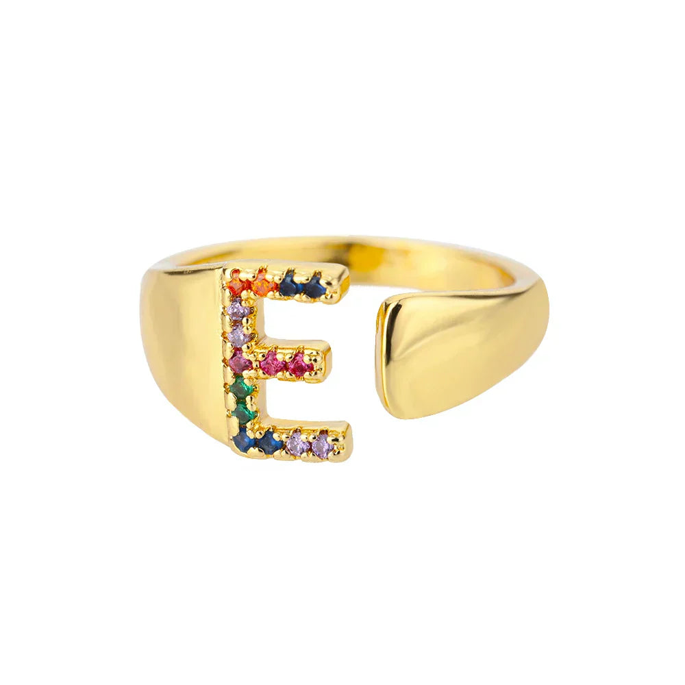 E - Guld initial ring i rostfritt stål