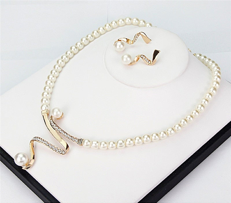 Fabién - Halsband med prästkragar + örhänge set