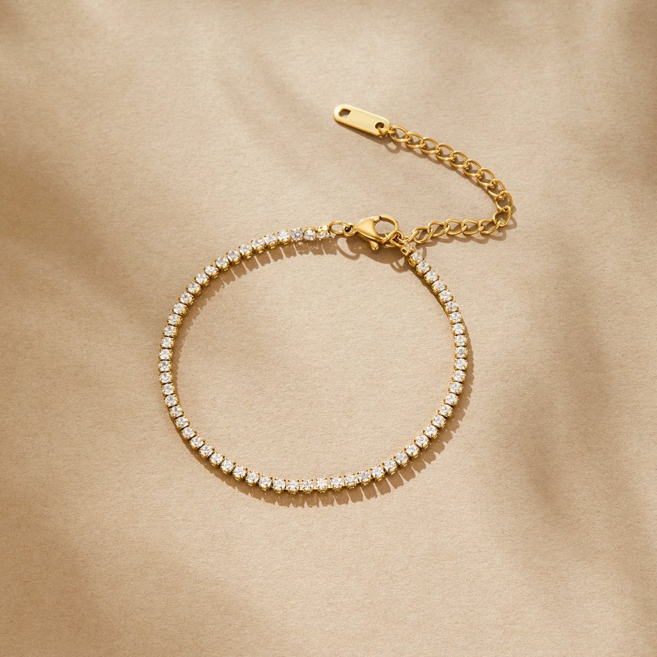 Kordelie guld tennisarmband
