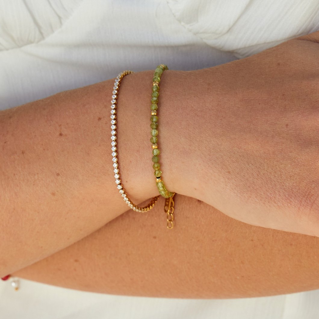 Kordelie guld tennisarmband