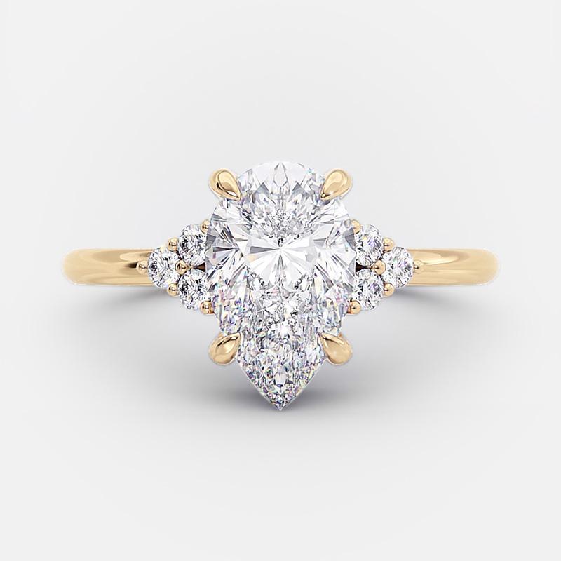 Klarissa – Ring med diamant i droppform med gyllene finish.