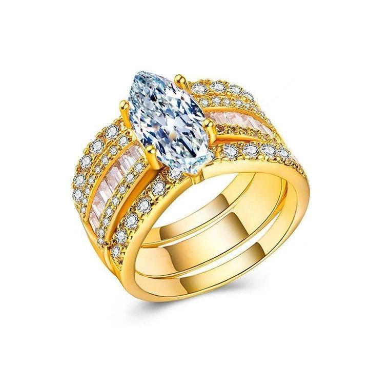 Verena – Ringset med kristall och gyllene detaljer.