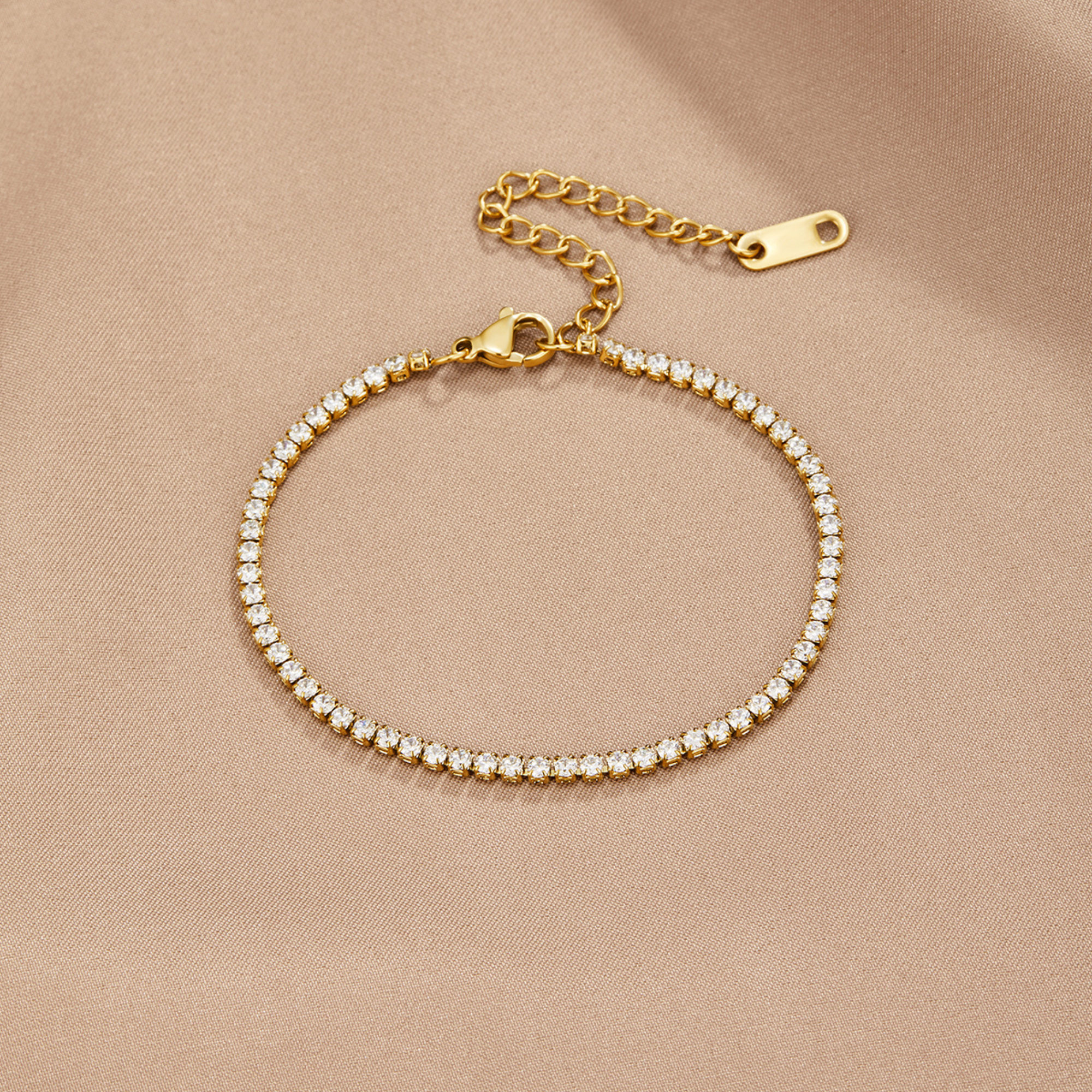 Kordelie guld tennisarmband