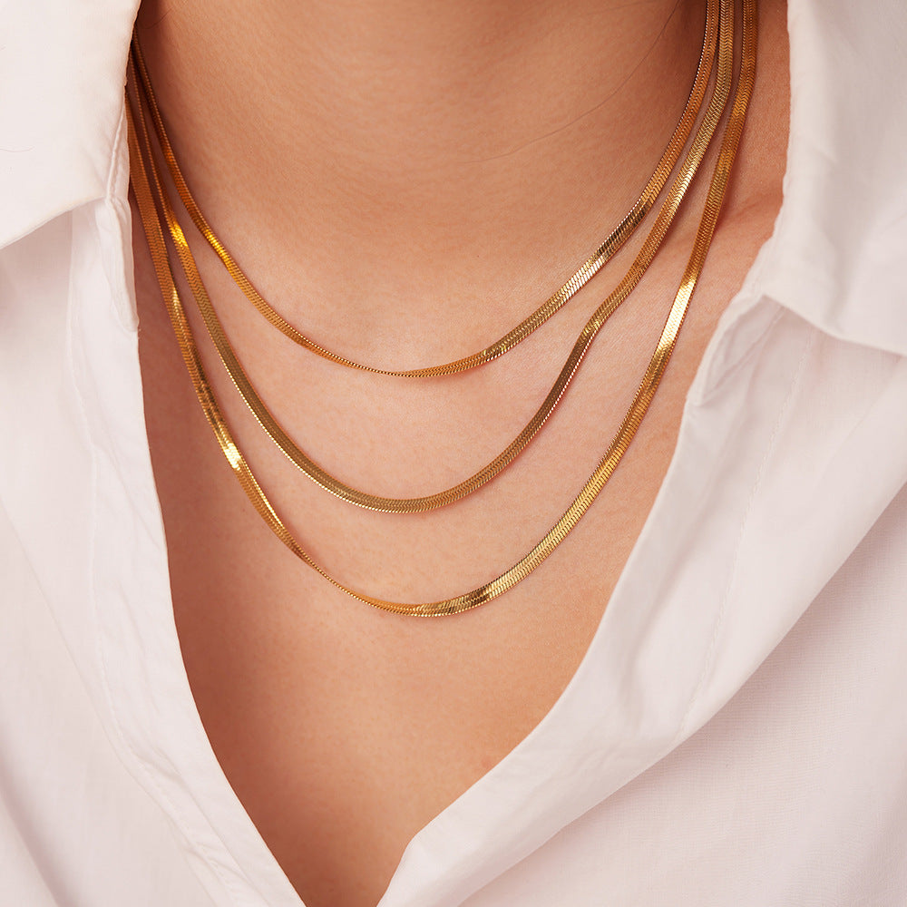Sofi – Flerlagrat halsband i 14 karat guld.