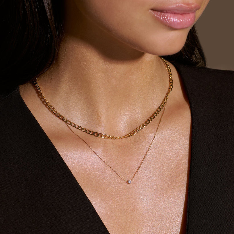 Halsband av platta ringar