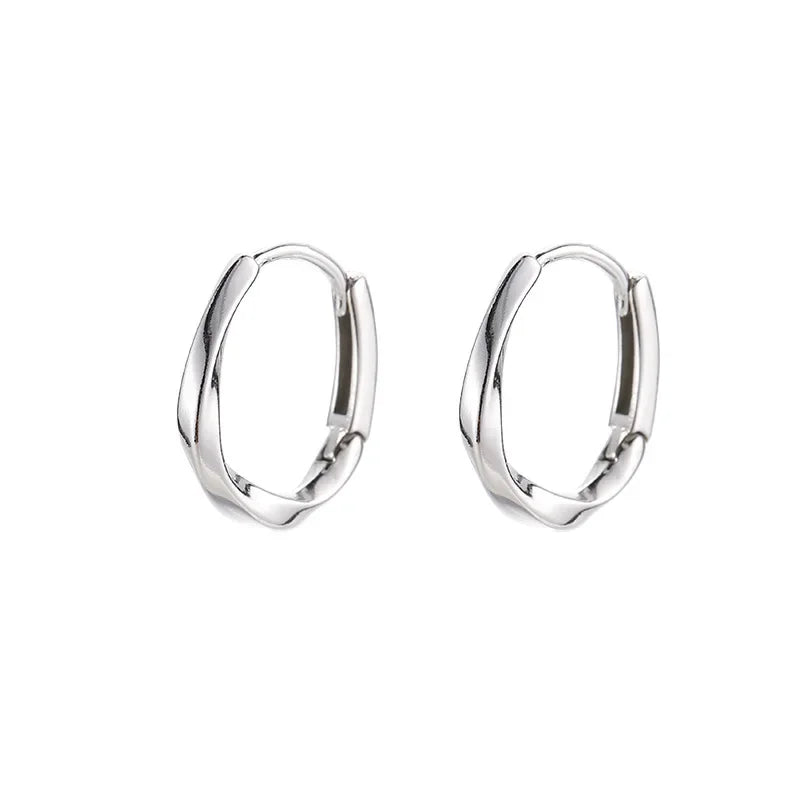 Örhängen i 925 sterling silver med rund infattning