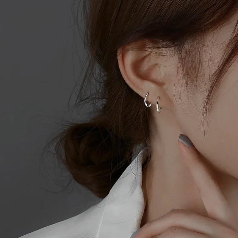 Örhängen i 925 sterling silver med rund infattning