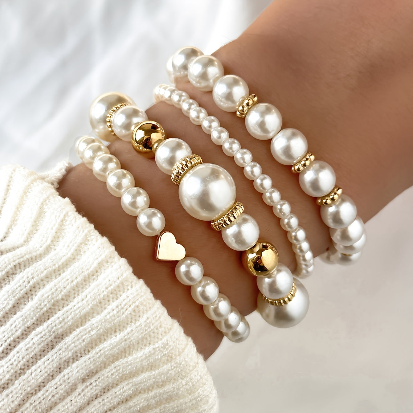 Armbandset med pärlor och hjärtan