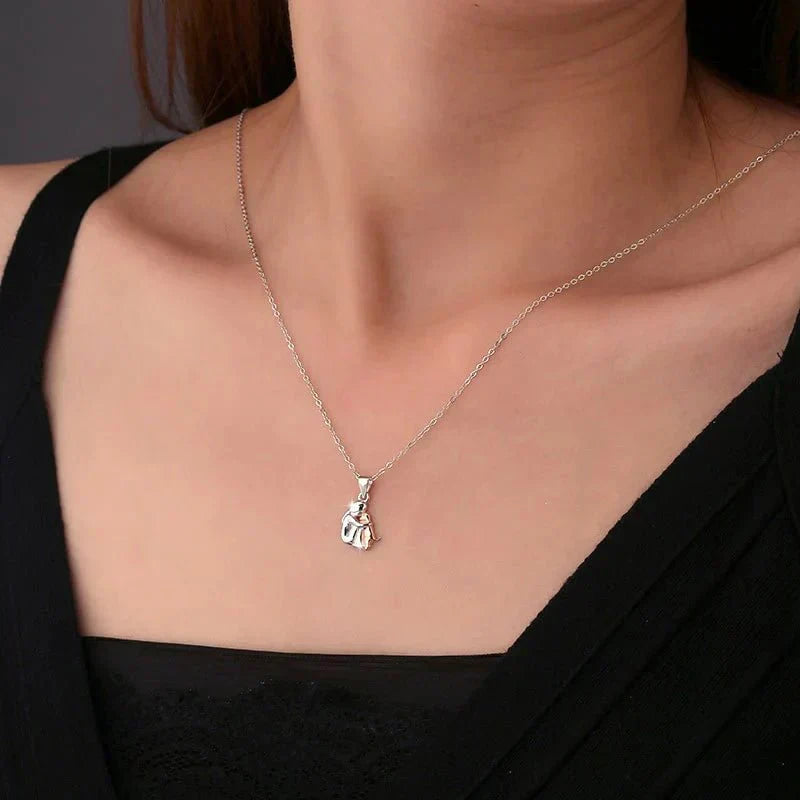 Halsband med hänge och örhängen