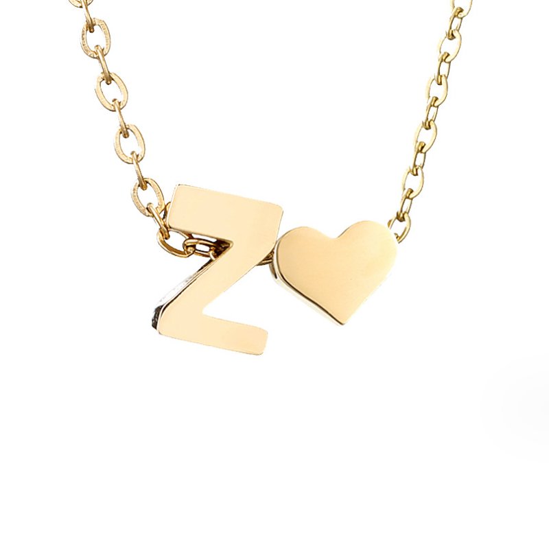 Nina – Guldhalsband i V-form.