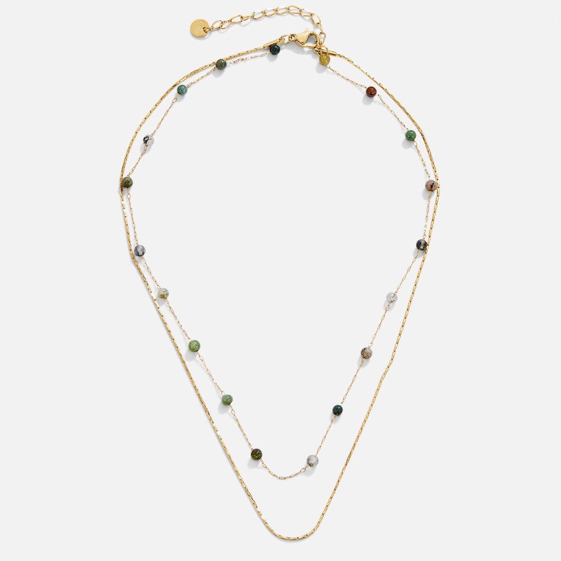 Helga – Halsband i två nivåer med små detaljer i färg.