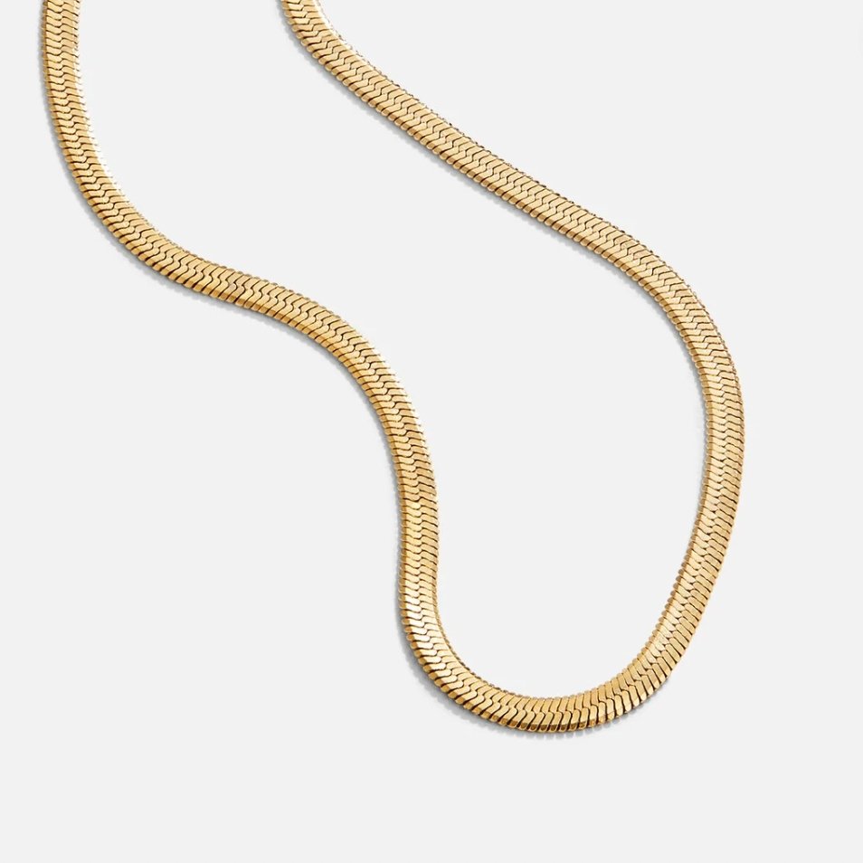 Elisa-Marie – Halsband i guld med mjuk kurva.